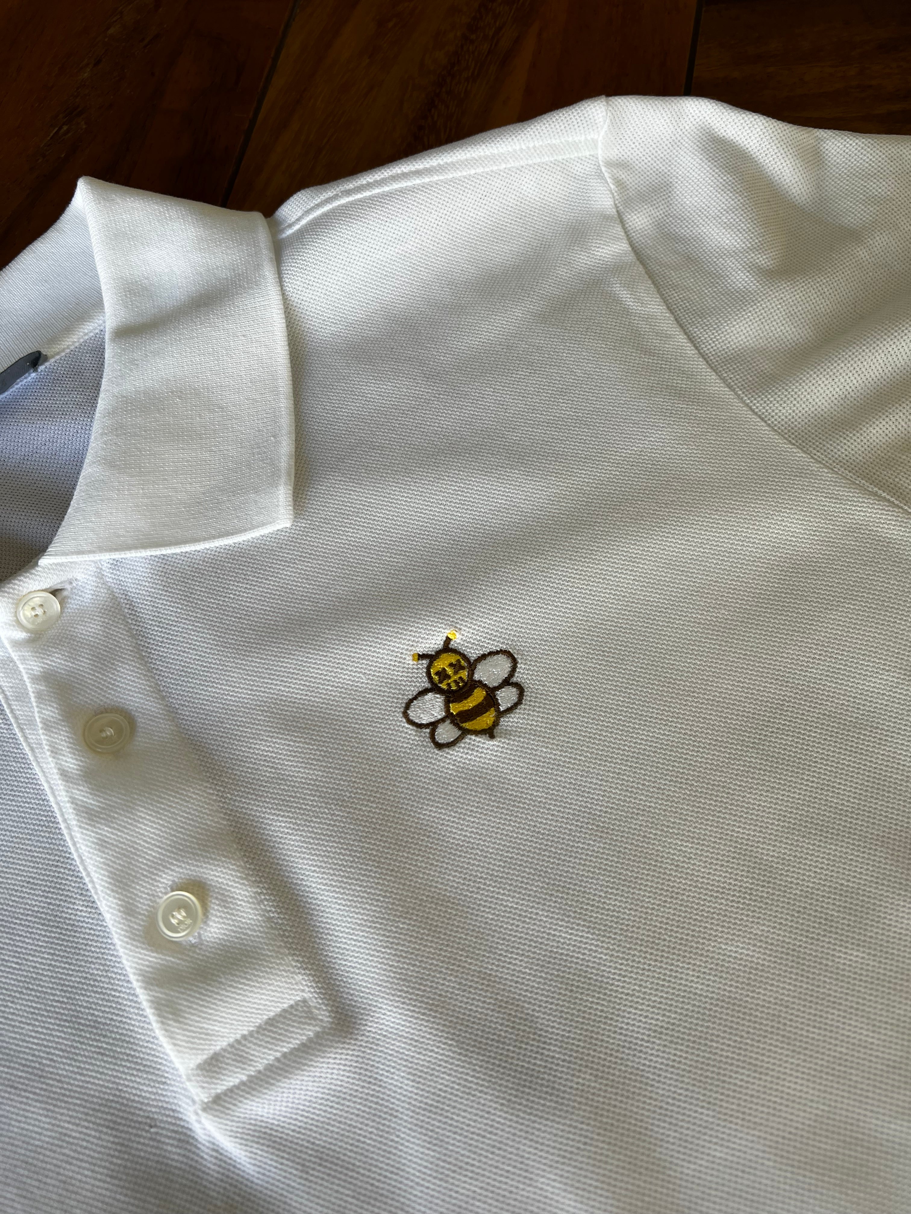 Player Dior x Kaws, Tipo polo